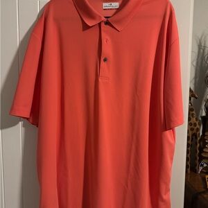 Grand Slam Men's Polo in Bold Orange
